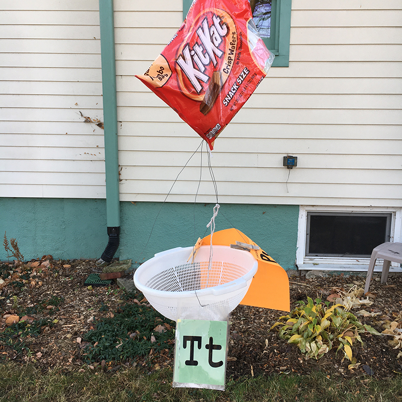 suspended plastic sieve, letter T and candy bag 