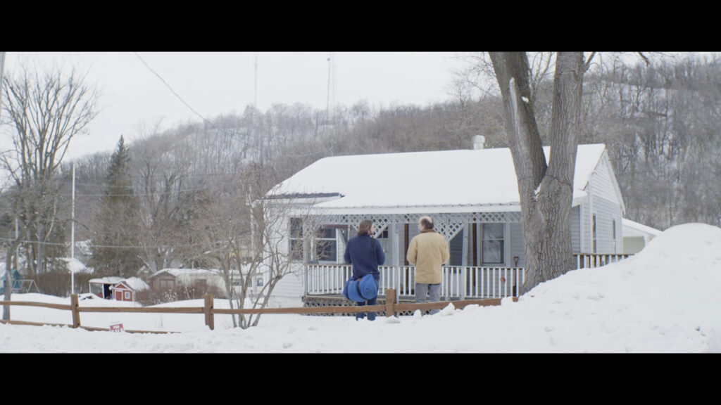 Calvin, left (Pat McCarthy) outside the house his father (Peter Knox) bought in a small town. Jackson Jarvis directed "Neptune," which will be shown at the 53704 Frame by Frame Film Festival on November 4, 2023, at the Barrymore Theatre in Madison, WIsconsin.