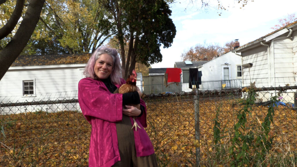 Kristy Jo McCloskey and one of her beloved chickens she talks about in Michelle Kelley's "Full Circle" that will be shown at the 53704 Frame by Frame Film Festival on November 4, 2023, at the Barrymore Theatre in Madison, Wisconsin.