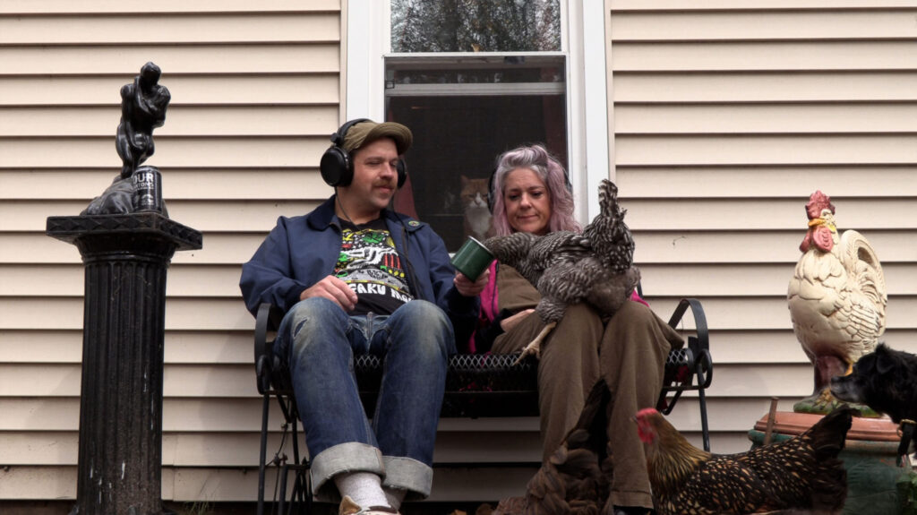Luke Vanness (left) and Kristy Jo McCloskey in their backyard in Michelle Kelley's "Full Circle," in which Kristy Jo shares her love of backyard chickens. "Full Circle" is part of the 53704 Frame by Frame Film Festival on November 4, 2023, at the Barrymore Theatre in Madison, Wisconsin