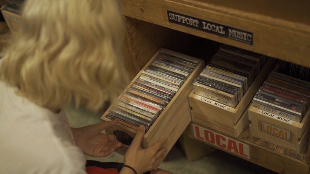 Liv Kleinfeldt, a part-time employee for B-Side goes through the local music section digging for gold. Mitch Deitz's documentary "Keep Spinning: A B-Side Story" will be shown at the 53704 Frame by Frame Film Festival at the Barrymore Theater on Nov. 4, 2023, in the film set starting at 3:30 pm.